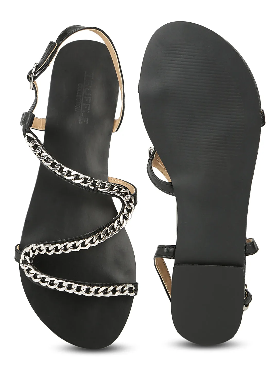 Schlupfschuhe mit schwarzer Kettenverzierung